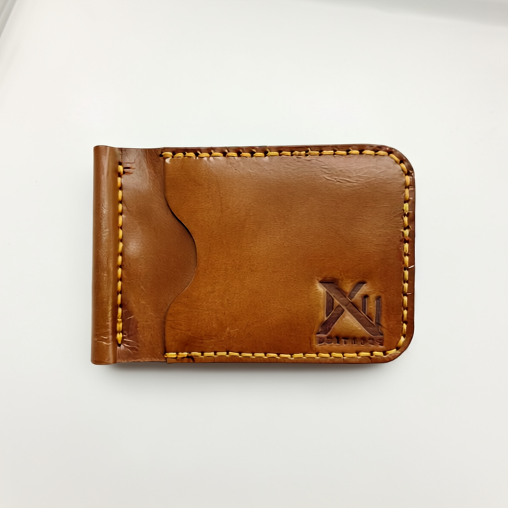 Brown leather wallet with stitching detail on a white background